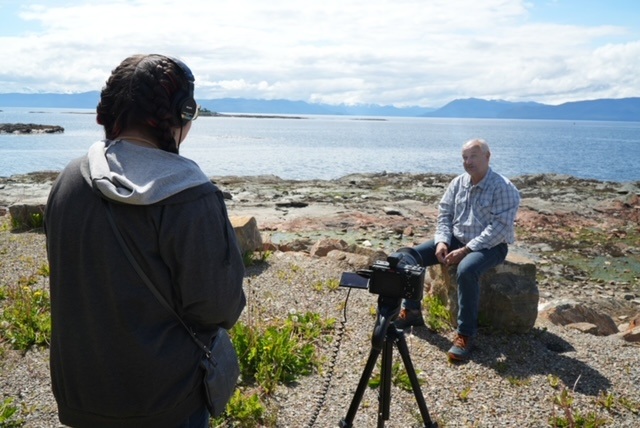 See Stories student at work filming an interview in Angoon.