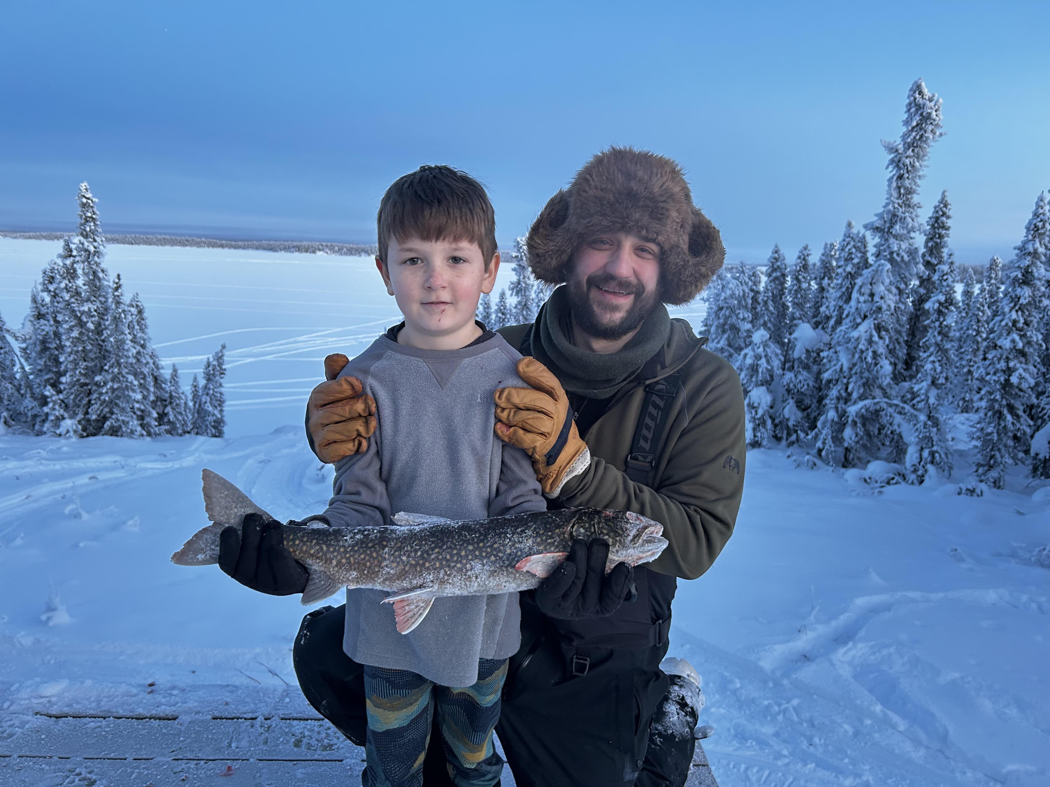 Ryan fishing with his son.